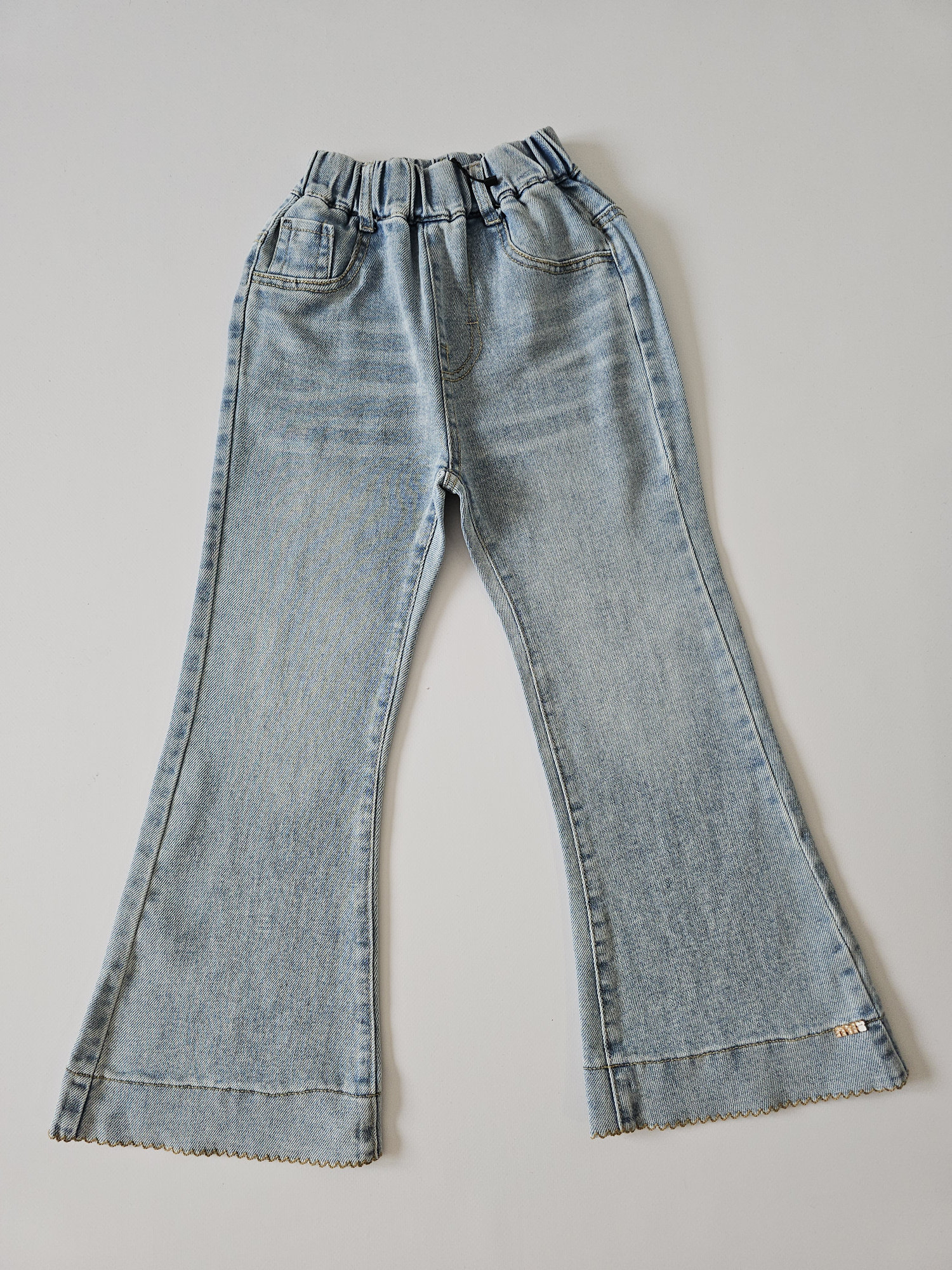 Джинсы Клёш